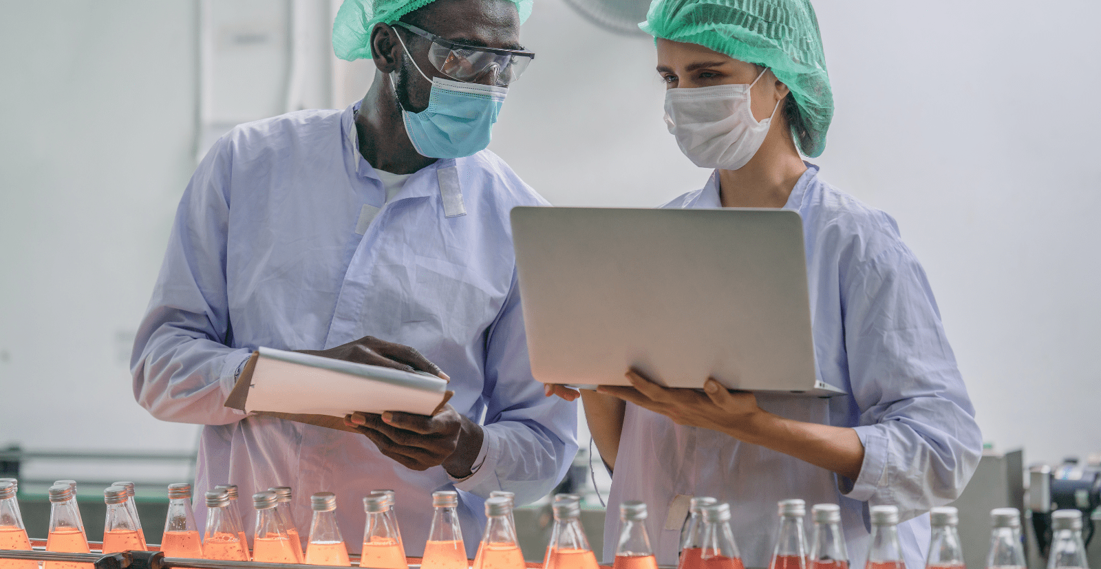 two people working at a food and beverage manufacturer