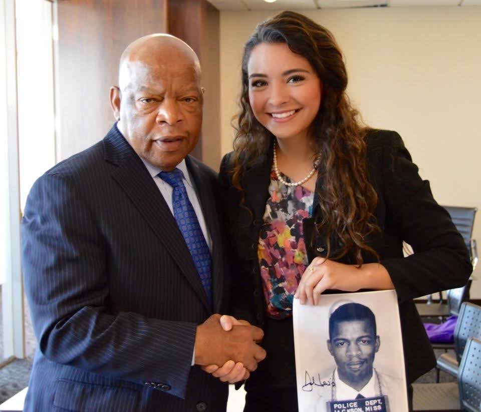 Ahva shaking hands with the late Congressman John Lewis